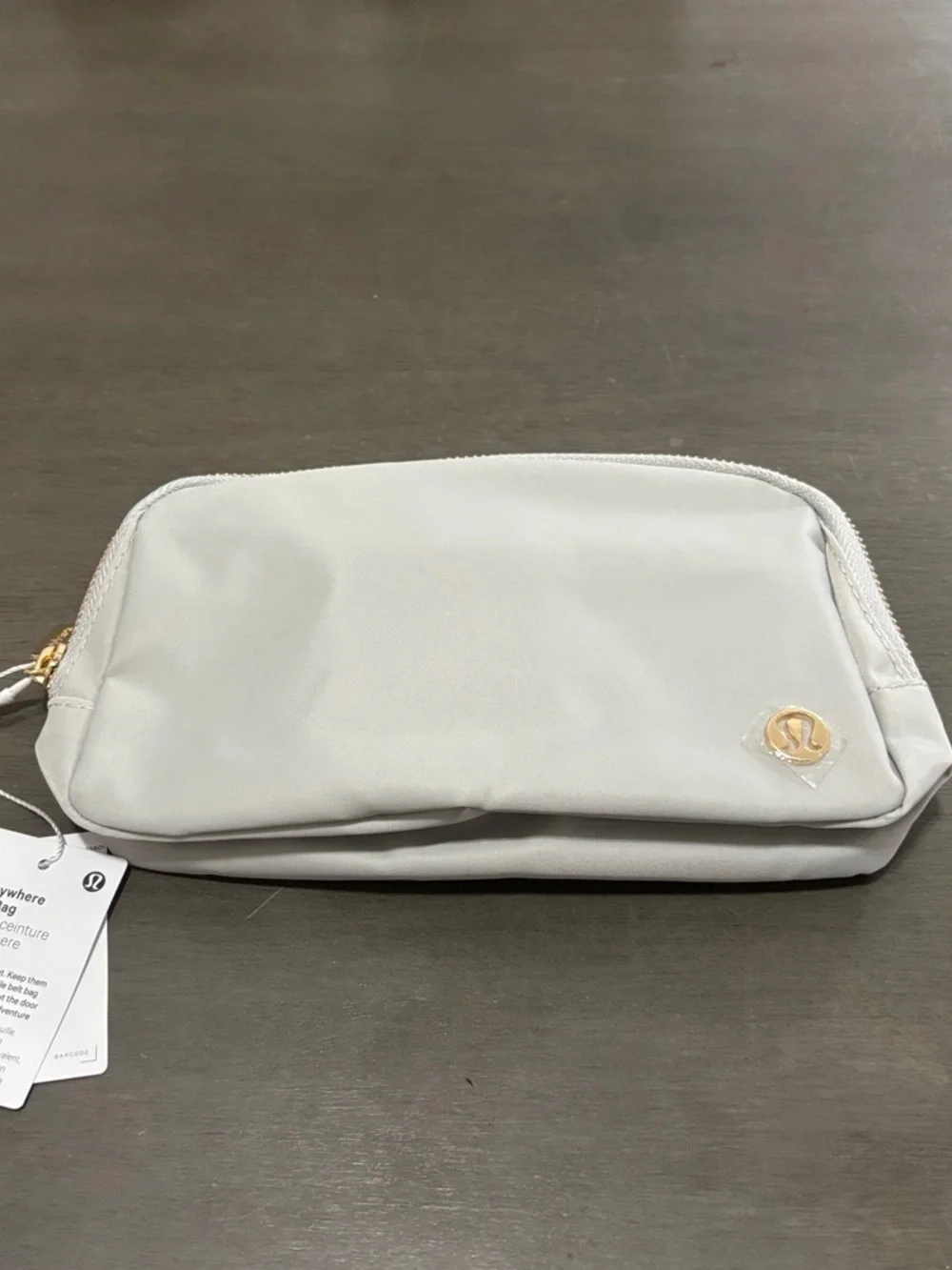 lululemon athletica Light Gray Cosmetic Pouch with Gold Logo